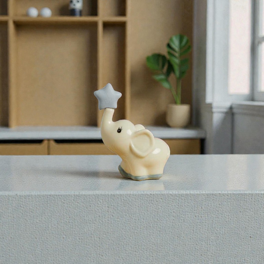 Statuina elefantino celeste - Bomboniere Claraluna